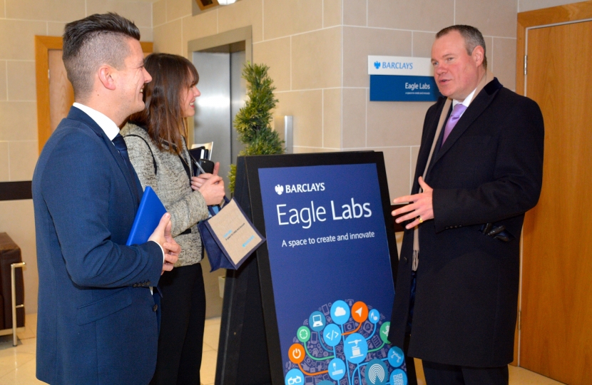 Conor Burns MP speaking with Eagle Lab staff.
