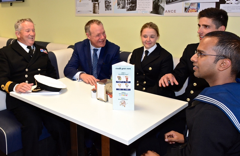 Conor with Commodore Jamie Miller CBE and Royal Navy Officer Cadets during his second visit to the Parlour.