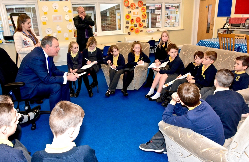 Conor talking to pupils at Kinson Primary School during his recent visit.