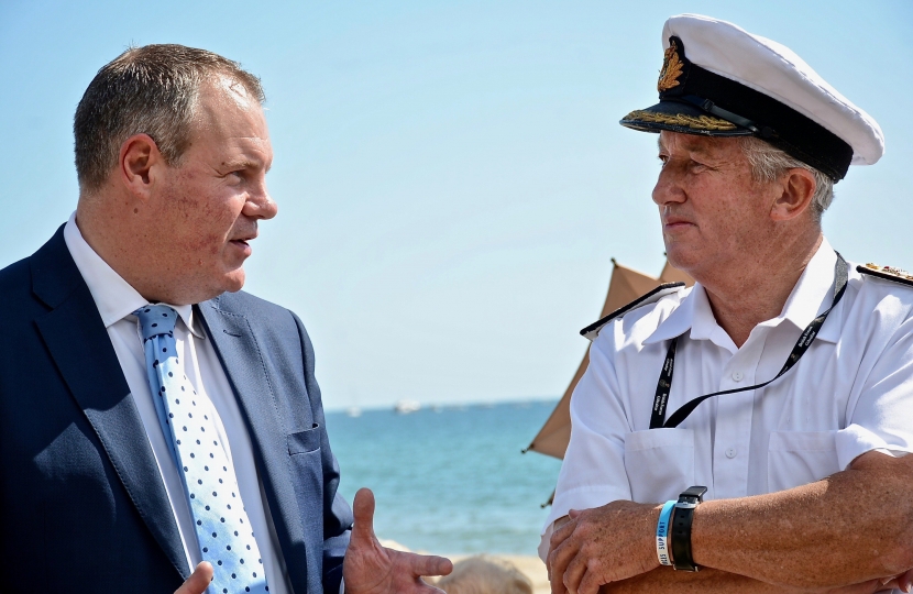 Conor with Commodore Jamie Miller of the Royal Navy on Bournemouth beach. Commodore has coordinated the Navy's role in the Air Festival since the start and will retire this month.