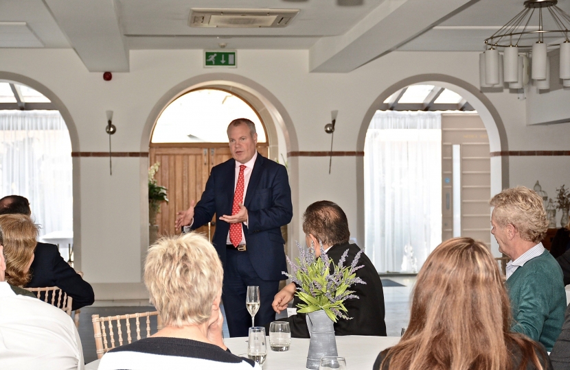 Conor pictured addressing guests at the Citizens Advice Merger Reception at Compton Acres.