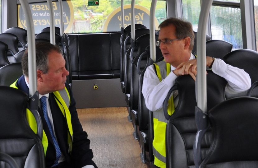 Conor pictured talking to Andrew on the top of a Yellow Buses double decker bus.