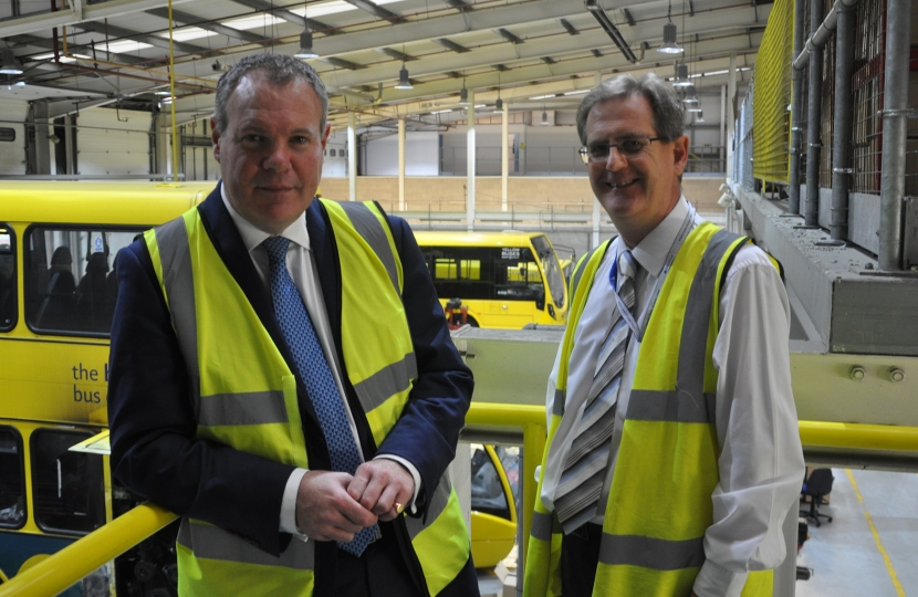 Conor pictured with MD Andrew Smith overlooking the Yellow Buses Depot.