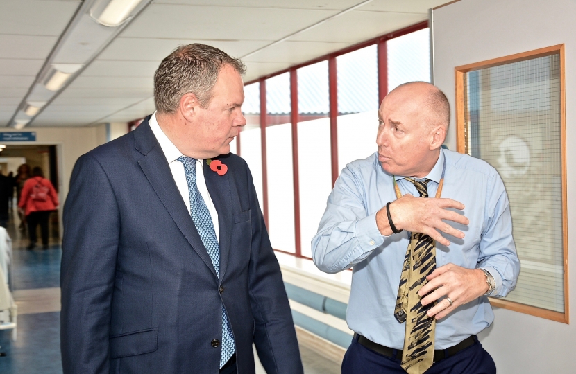 Conor pictured walking through Royal Bournemouth Hospital with Chief Executive, Tony Spotswood. 