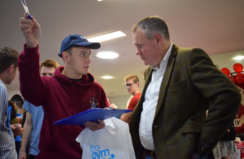 Conor pictured signing up student with BU Conservative Society.