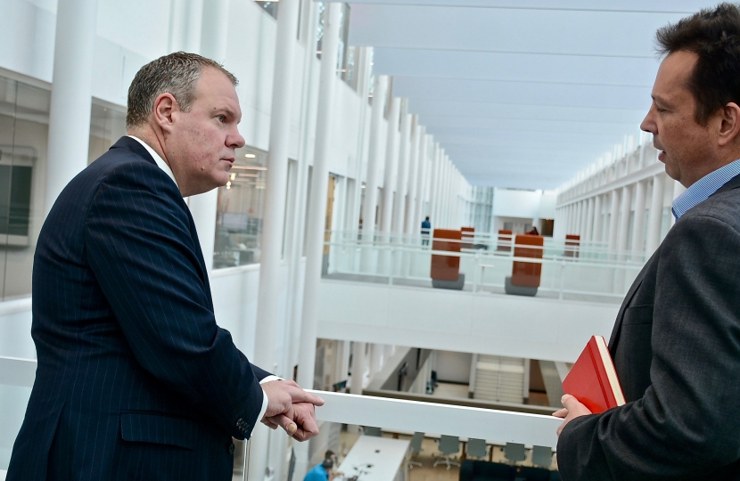 Conor pictured speaking with Gary Ford (Technology Managing Director) overlooking the JP Morgan atrium. 