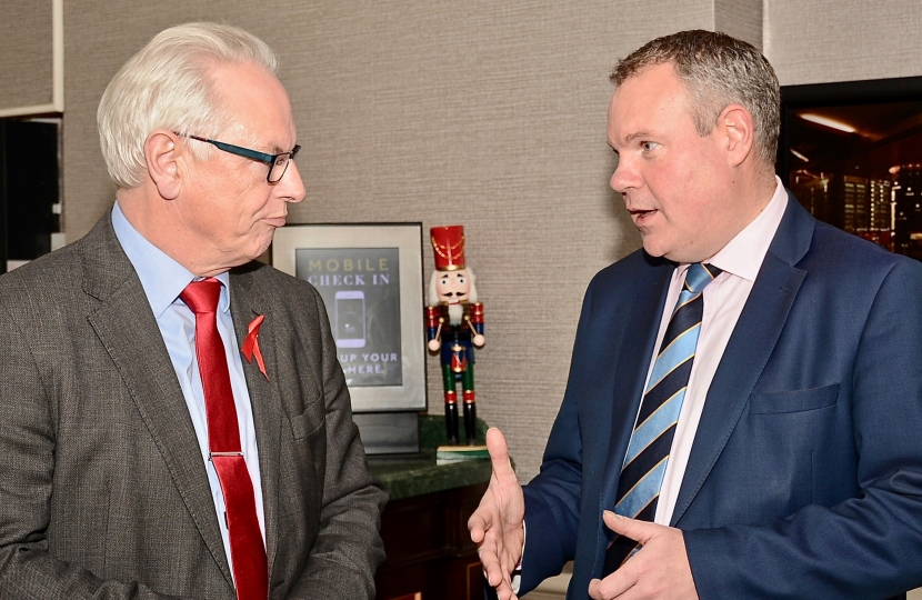 Conor pictured speaking with Lord Maude of Horsham before the dinner. 