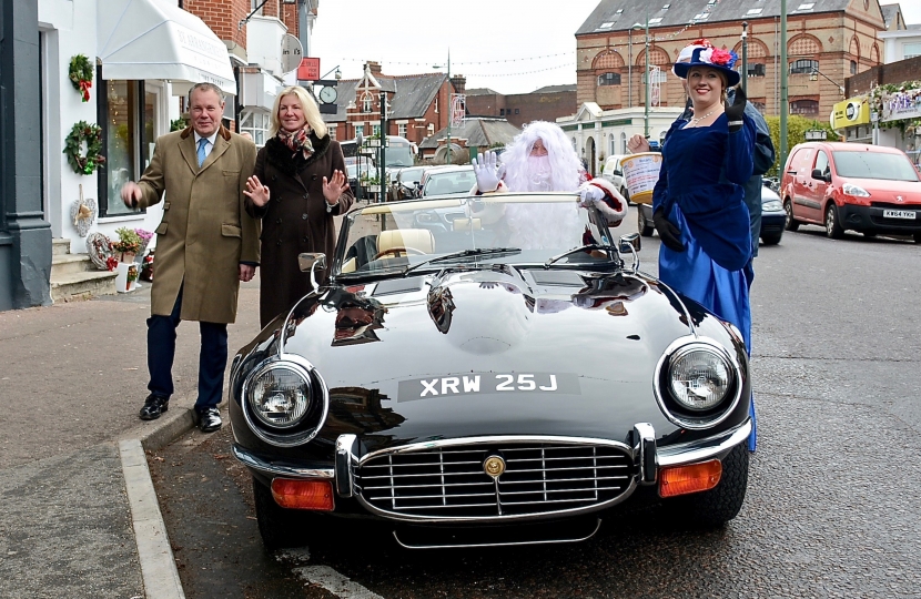 Conor pictured with Westbourne Rotary Club organisers and Santa Claus who arrived in a vintage sports car. 