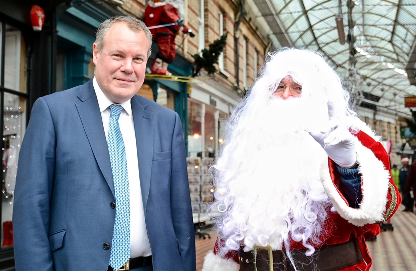 Conor pictured with Santa Claus in Westbourne Arcade.
