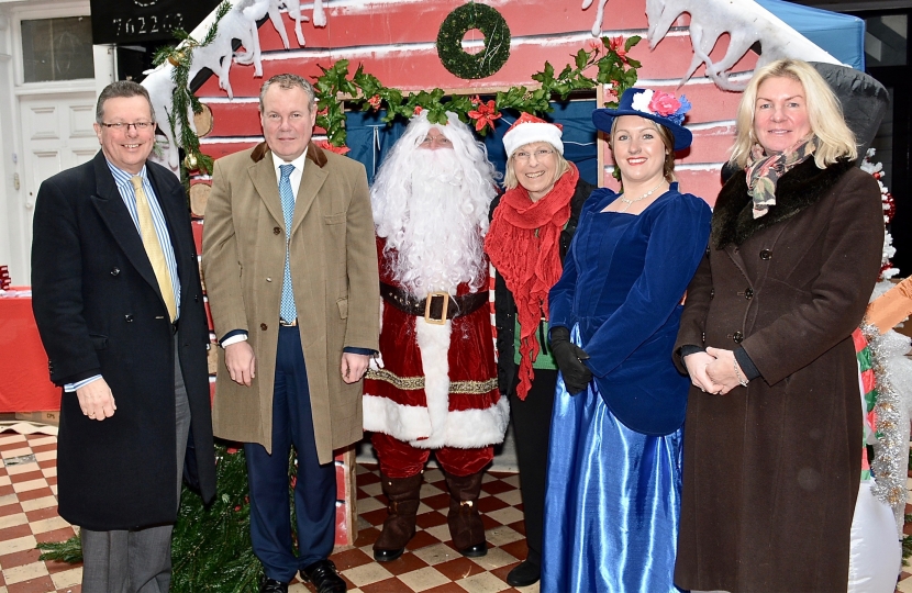 Conor pictured with Bournemouth Council Leader, John Beesley, Santa Claus and organisers of the Westbourne Rotary Club.