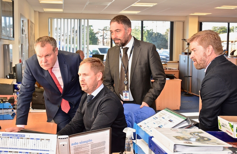 Conor pictured being shown how SGN operates.