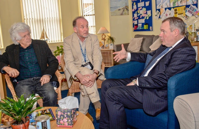 Conor pictured sitting with Cancer Trust clients at the coffee discussion.