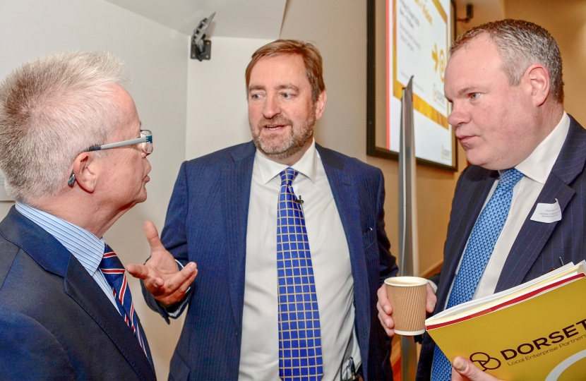 Conor pictured speaking with Jim Stewart, Chair of the Dorset LEP.