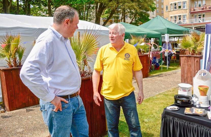 Conor pictured talking amongst the vendors at the fete.