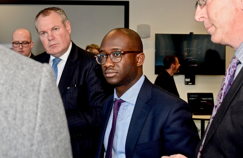 Conor pictured with Sam Gyimah MP attending the academic showcase put on by the University. 