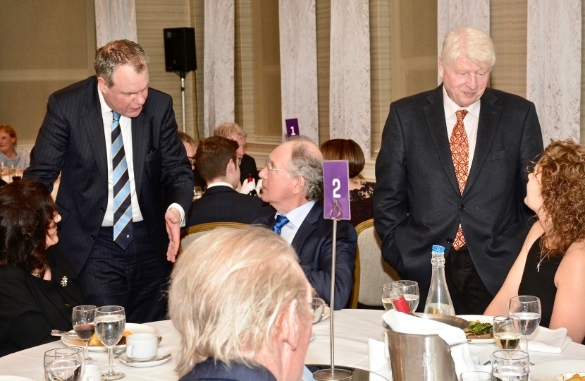 Conor pictured discussing local and national issues with Stanley Johnson and guests of the Sixty-Six Club. 
