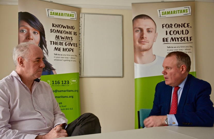 Conor is briefed on the work of the Samaritans in Bournemouth.