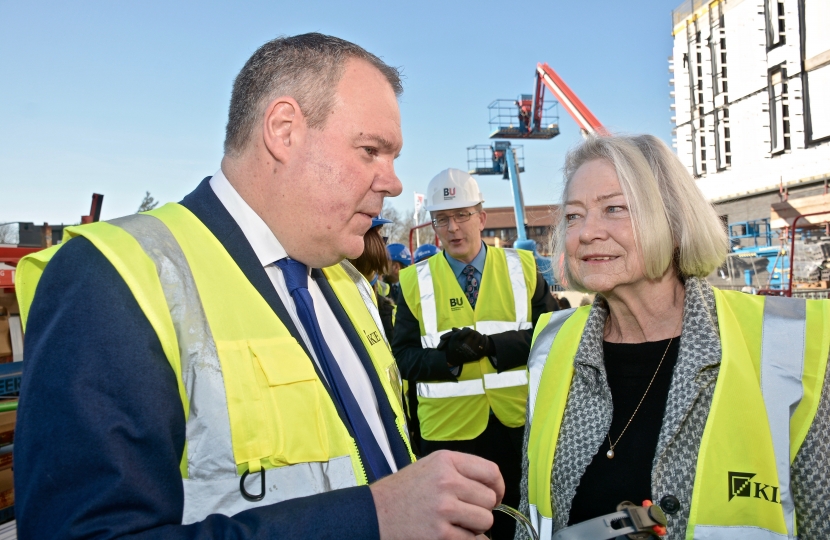 Conor chats to Kate Adie at the topping out ceremony.