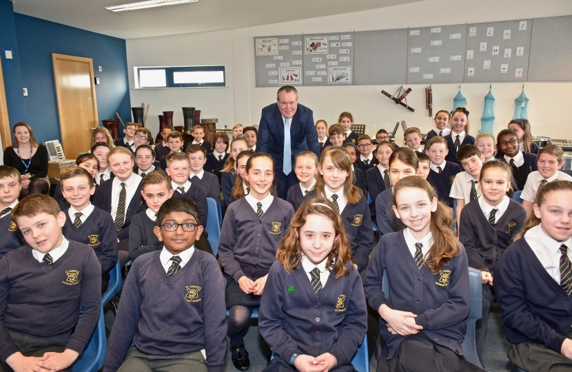 Conor with pupils at St Joseph's School, Alderney.