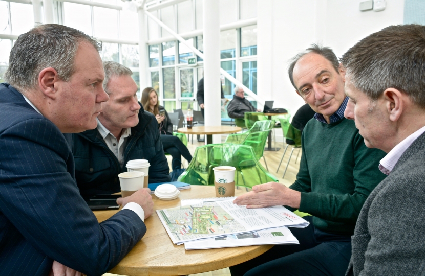 Conor discussing the plans for the development of Talbot Village and White Farm with Ian Jones from BU and local residents.