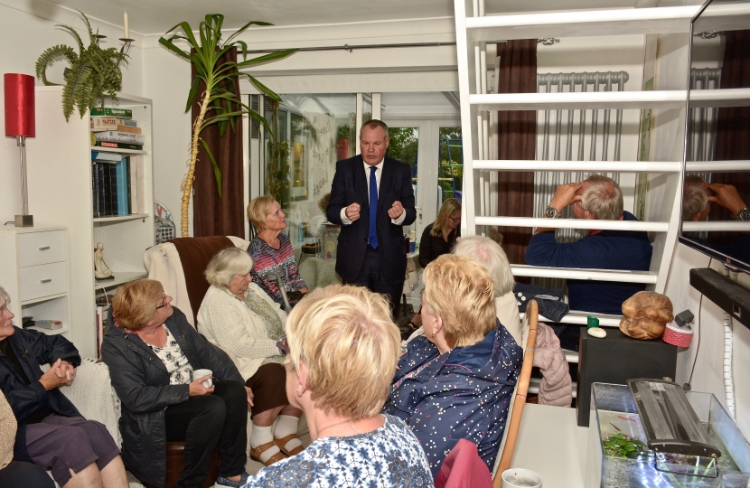 Conor addressing a house meeting in Wallisdown.