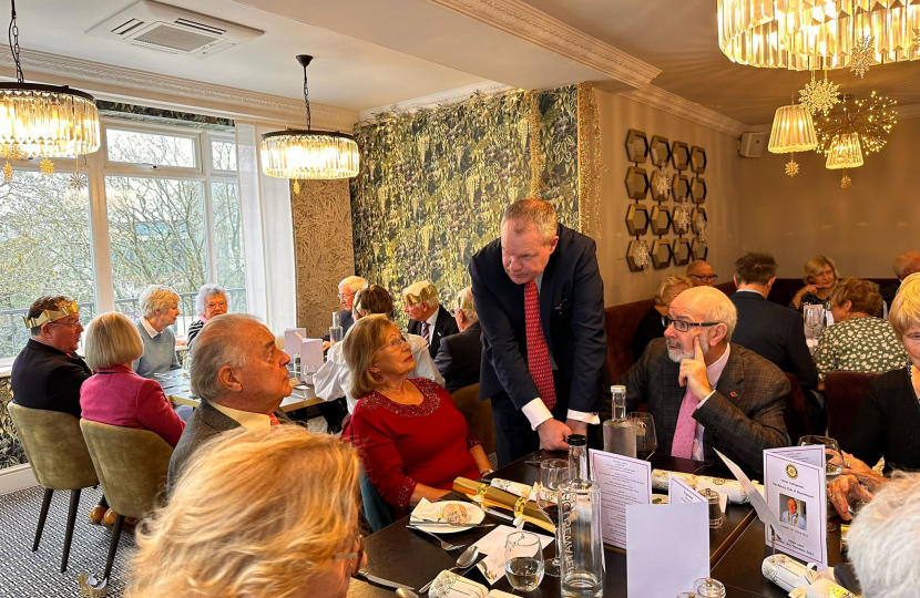Conor speaking with members of the Bournemouth Rotary Club