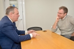 Conor discussing how to best help those with addictions with Bournemouth YMCA CEO Dr Gareth Sherwood.