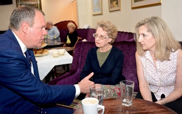 Conor chats with members of Westbourne Conservatives over afternoon tea.