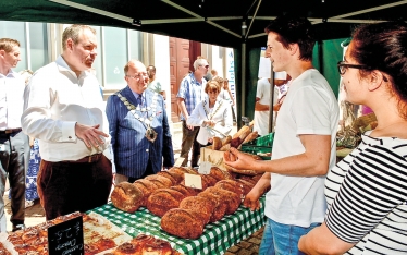 Conor and the Mayor chat to stall holders at the Bournemouth Food Festival.
