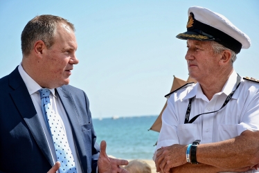 Conor with Commodore Jamie Miller of the Royal Navy on Bournemouth beach. Commodore has coordinated the Navy's role in the Air Festival since the start and will retire this month.