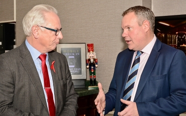 Conor pictured speaking with Lord Maude of Horsham before the dinner. 