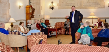 Conor pictured joking with residents of Brompton Court.