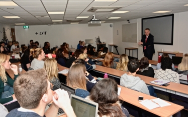 Conor pictured talking to BU students about the local tourism after Brexit. 