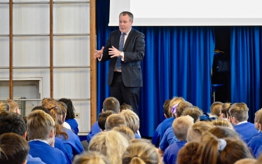 Conor pictured talking to Key Stage 2 students in assembly about the role of an MP. 