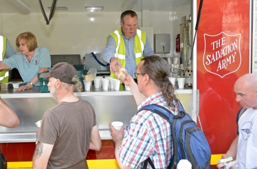 Conor pictured handing out food with the Salvation Army over the May Bank Holiday weekend. 