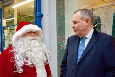 Conor welcoming Santa to Westbourne Arcade.