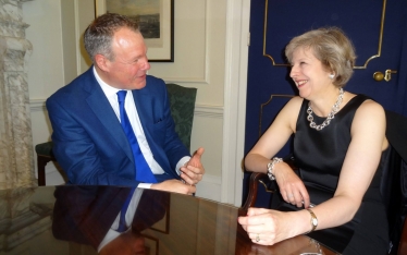 Conor alongside the Prime Minister, Theresa May during his visit to Downing St